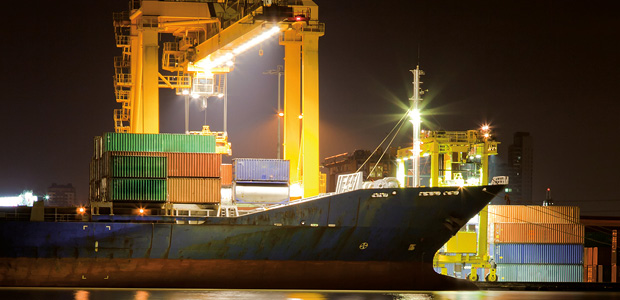 commercial shippign vessel at night