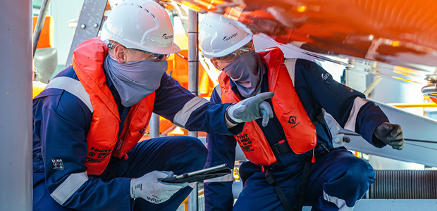 Technician wearing commercial Lifejacket