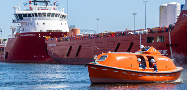 Lifeboat with technicians on water