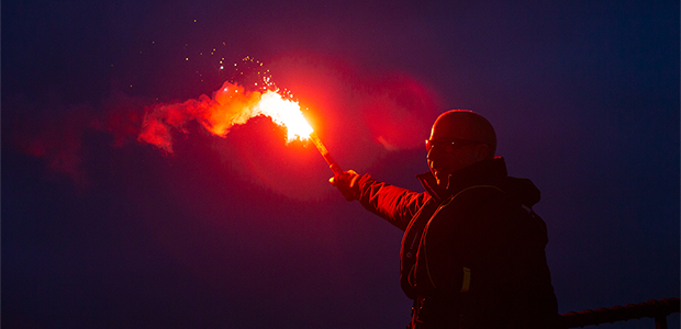 Man holding flare
