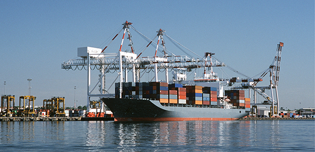 Container ship arriving at shipyard